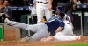 Houston Astros' Yordan Alvarez (44) scores as Seattle Mariners starting pitcher Marco Gonzales (7) covers home plate after throwing a wild pitch during the second inning of a baseball game Thursday, Sept. 5, 2019, in Houston. (AP Photo/David J. Phillip)