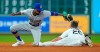 Houston Astros' Myles Straw (26) steals second base as Seattle Mariners' Dee Gordon (9) reaches to tag him during the seventh inning of a baseball game Friday, June 28, 2019, in Houston. (AP Photo/David J. Phillip)
