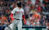 Boston Red Sox's Rafael Devers watches his home run against the Houston Astros during the fourth inning of a baseball game Sunday, May 26, 2019, in Houston. (AP Photo/David J. Phillip)