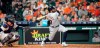 Detroit Tigers' Ronny Rodriguez, right, hits a home run as Houston Astros catcher Robinson Chirinos watches during the sixth inning of a baseball game Monday, Aug. 19, 2019, in Houston. (AP Photo/David J. Phillip)