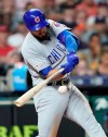 Chicago Cubs' David Bote hits a two-run home run against the Houston Astros during the sixth inning of a baseball game Tuesday, May 28, 2019, in Houston. (AP Photo/David J. Phillip)