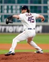Houston Astros starting pitcher Gerrit Cole (45) throws against the Tampa Bay Rays during the first inning of a baseball game Wednesday, Aug. 28, 2019, in Houston. (AP Photo/Michael Wyke)