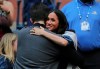 Meghan, Duchess of Sussex, greets Alexis Ohanian, as she arrives to watch the women's singles final of the U.S. Open tennis championships between Serena Williams, of the United States, and Bianca Andreescu, of Canada, Saturday, Sept. 7, 2019, in New York. (AP Photo/Charles Krupa)