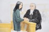 In this courtroom sketch, Meng Wanzhou, left, the chief financial officer of Huawei Technologies speaks to her lawyer David Martin during a bail hearing at B.C. Supreme Court in Vancouver, on Monday, December 10, 2018. THE CANADIAN PRESS/Jane Wolsak