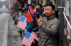 People gather along the streets in hopes of seeing a motorcade for North Korean leader Kim Jong Un or President Donald Trump pass by in Hanoi, Vietnam, Thursday, Feb. 28, 2019. Kim and Trump are meeting for a second day in Hanoi for their second summit. (AP Photo/Susan Walsh)