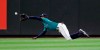 Seattle Mariners left fielder Mallex Smith and catches a sacrifice fly by Houston Astros' Tony Kemp during the eighth inning of a baseball game Thursday, June 6, 2019, in Seattle. (AP Photo/Elaine Thompson)
