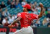 Los Angeles Angels pitcher Felix Pena throws to a Seattle Mariners batter during the second inning of a baseball game Thursday, May 30, 2019, in Seattle. (AP Photo/Ted S. Warren)