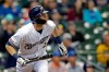Milwaukee Brewers' Christian Yelich watches the ball after hitting a solo home run during the first inning of a baseball game against the Washington Nationals Wednesday, May 8, 2019, in Milwaukee. (AP Photo/Aaron Gash)