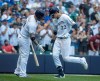 Milwaukee Brewers' Christian Yelich is congratulated after hitting a home run during the sixth inning of a baseball game against the San Francisco Giants Sunday, July 14, 2019, in Milwaukee. (AP Photo/Morry Gash)