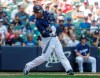 Milwaukee Brewers' Keston Hiura hits an RBI double during the sixth inning of a baseball game against the Atlanta Braves Wednesday, July 17, 2019, in Milwaukee. (AP Photo/Morry Gash)