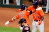 Houston Astros' Yuli Gurriel (10) celebrates with Yordan Alvarez past Washington Nationals catcher Yan Gomes after his home run during the second inning of Game 7 of the baseball World Series Wednesday, Oct. 30, 2019, in Houston. (AP Photo/Sue Ogrocki)