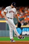 Houston Astros starting pitcher Justin Verlander kicks the mound after giving up a two-RBI double to Washington Nationals' Anthony Rendon during the first inning of Game 2 of the baseball World Series Wednesday, Oct. 23, 2019, in Houston. (AP Photo/Matt Slocum)