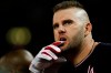 Washington Nationals first baseman Matt Adams watches during the sixth inning of Game 5 of the baseball World Series against the Houston Astros Sunday, Oct. 27, 2019, in Washington. (AP Photo/Jeff Roberson)