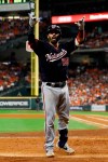 Washington Nationals' Kurt Suzuki celebrates after a home run during the seventh inning of Game 2 of the baseball World Series against the Houston Astros Wednesday, Oct. 23, 2019, in Houston. (AP Photo/Matt Slocum)