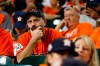 Fans watch during the eighth inning of Game 2 of the baseball World Series between the Houston Astros and the Washington Nationals Wednesday, Oct. 23, 2019, in Houston.(AP Photo/Matt Slocum)