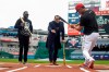 Alex Rodriguez and David Ortiz watch Washington Nationals' Juan Soto swing the bat before Game 3 of the baseball World Series against the Houston Astros Friday, Oct. 25, 2019, in Washington. (AP Photo/Pablo Martinez Monsivais)