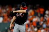 Washington Nationals starting pitcher Stephen Strasburg reacts after giving up a walk during the fourth inning of Game 6 of the baseball World Series against the Houston Astros Tuesday, Oct. 29, 2019, in Houston. (AP Photo/Matt Slocum)
