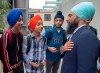 NDP Leader Jagmeet Singh chats with young supporters during a campaign stop at the University of Manitoba in Winnipeg on Tuesday, Sept. 24, 2019. THE CANADIAN PRESS/Andrew Vaughan
