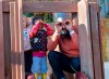 NDP Leader Jagmeet Singh and a young girl imitate the cameras as they stand on a play structure during a campaign stop at Hastings Park Childcare in Vancouver on Monday, Sept. 30, 2019. THE CANADIAN PRESS/Andrew Vaughan