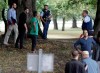 Police attempt to move people away from outside a mosque in central Christchurch, New Zealand, Friday, March 15, 2019. Many people were killed in a mass shooting at a mosque in the New Zealand city of Christchurch on Friday, a witness said. Police have not yet described the scale of the shooting but urged people in central Christchurch to stay indoors. (AP Photo/Mark Baker)