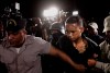 Eddy Vladimir Feliz Garcia, in custody in connection with the shooting of former Boston Red Sox slugger David Ortiz, is transferred by police to court in Santo Domingo, Dominican Republic, Tuesday, June 11, 2019. His lawyer Deivi Solano said Feliz Garcia had no idea who he'd picked up and what was about to happen, and that he expected Feliz Garcia would be charged as an accomplice to an attempted murder. (AP Photo/Roberto Guzman)