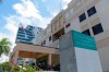 Journalists wait outside the hospital where David Ortiz is being treated in Santo Domingo, Dominican Republic, Monday, June 10, 2019. Doctors removed Ortiz’s gallbladder and part of his intestine after the beloved former Boston Red Sox slugger known as Big Papi was ambushed by a gunman at a bar in his native Dominican Republic on Sunday night, a spokesman said Monday. (AP Photo/Roberto Guzmán)