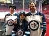 MIKE MCINTYRE / WINNIPEG FREE PRESS
Arsenii Varchuk, 11, with mom, Ilona, and his dad, Yuriya, is a student at Stevenson-Britannia School in Winnipeg. He came to Canada three years ago from Minsk, Belarus, and fell in love with hockey and the Jets. He is in Montreal today for the game as part of an Air Canada fan promotion.