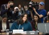 Cameras follow Jody Wilson Raybould as she waits to appear in front of the Justice committee in Ottawa, Wednesday February 27, 2019. THE CANADIAN PRESS/Adrian Wyld