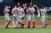 Canadian team players celebrate after beating Cuba during the Group C of the WBSC Premier12 2019 world baseball tournament at Gocheok Sky Dome in Seoul, South Korea, Wednesday, Nov. 6, 2019. (AP Photo/Ahn Young-joon)