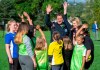 Federal Conservative leader Andrew Scheer and his wife Jill conduct a cheer with children playing soccer at a campaign event in Kelowna, B.C. on Monday September 16, 2019. THE CANADIAN PRESS/Frank Gunn