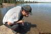 JOE.BRYKSA@FREEPRESS.MB.CA
Sam Wood takes a drink from Kalicahoolie Lake, north of Wasagamack. This is traditional hunting and fishing area for the First Nation.