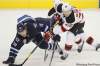 THE CANADIAN PRESS/John Woods
New Jersey Devils forward Patrik Elias (26) takes out Winnipeg Jets forward Bryan Little (18) during first period NHL action in Winnipeg on Saturday.