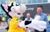 Conservative leader Andrew Scheer is greeted by a mascot while visiting an agricultural fair in St-Hyacinthe , Que. on Tuesday, July 23, 2019. THE CANADIAN PRESS/Paul Chiasson