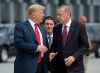 Donald Trump (left) announced the U.S. forces pullout, hours after going “off script” during a telephone conversation with Turkish President Recep Tayyip Erdogan. (Pablo Martinez Monsivais / Associated Press files)