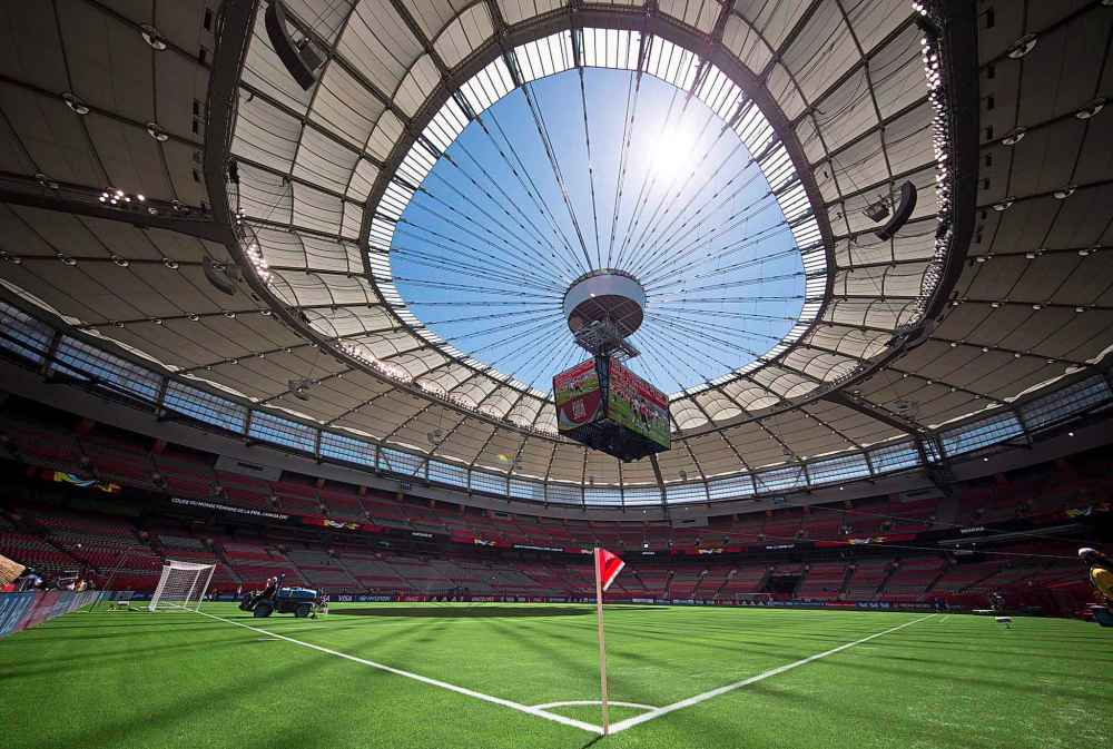 Water is sprayed on the artificial turf before Switzerland and Ecuador play a FIFA Women's World Cup soccer match at B.C. Place stadium in Vancouver, B.C., on June 12, 2015. (Darryl Dyck / The Canadian Press files)