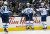 JAY LAPRETE / THE ASSOCIATED PRESS
Winnipeg Jets' Blake Wheeler, center, celebrates his goal against the Columbus Blue Jackets with teammates Patrik Laine, left, of Finland, and Mark Scheifele during the third period of an NHL hockey game Sunday, March 3, 2019, in Columbus, Ohio. The Jets beat the Blue Jackets 5-2.