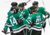 BRANDON WADE / THE ASSOCIATED PRESS
Dallas Stars forward Jamie Benn (14) is congratulated by Dallas Stars forward Alexander Radulov (47) and other teammates after scoring a goal during the second period of an NHL hockey game against the Winnipeg Jets, Saturday, Oct. 6, 2018, in Dallas.