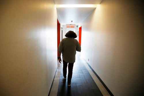 Ramona walks to her room at the Bell Hotel. (John Woods / Winnipeg Free Press)