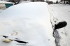 Owners of cars on the street during a parking ban are given a $200 ticket for violating a ban, but the city covers the towing cost. (Joe Bryksa / Winnipeg Free Press files)