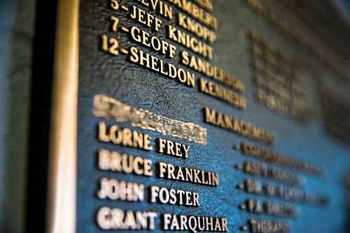 A plaque at Innovation Credit Union iPlex in Swift Current commemorating the  Broncos' 1989 Memorial Cup win has Graham James' name scratched out.  (Mikaela MacKenzie / Winnipeg Free Press)