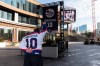 JESSE BOILY  / WINNIPEG FREE PRESS
Winnipeg Jets and Dale Hawerchuk fan Marco Almeida shows his respect at the Dale Hawerchuk banner in True North Square on Tuesday.