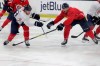 Florida Panthers' Mark Pysyk, left, passes the puck as Josh Brown, right, defends during NHL hockey training practice Friday, July 17, 2020, in Coral Springs, Fla. THE CANADIAN PRESS/AP/Lynne Sladky