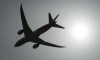 A plane is silhouetted as it takes off from Vancouver International Airport in Richmond, B.C., Monday, May 13, 2019. Regional airlines are demanding immediate action from Ottawa to prop up the beleaguered sector, but reject the idea of a federal stake in carriers. THE CANADIAN PRESS/Jonathan Hayward