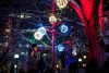 People take a photo together during the opening night of Christmas Lights Across Canada, in Ottawa, on Wednesday, Dec. 4, 2019. The likelihood that most Canadians will enjoy a holly jolly Christmas season of gatherings, caroling and travel is unlikely, say public health experts who encourage those who revel in holiday traditions to accept more sacrifices ahead. THE CANADIAN PRESS/Justin Tang