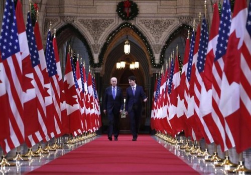 Prime Minister Justin Trudeau and US vice-president Joe Biden walk down the Hall of Honour on Parliament Hill in Ottawa on Friday, December 9, 2016. The election of Democrat Joe Biden as the next president of the United States is expected to have wide-ranging implications for Canadian politics and policy. THE CANADIAN PRESS/Patrick Doyle