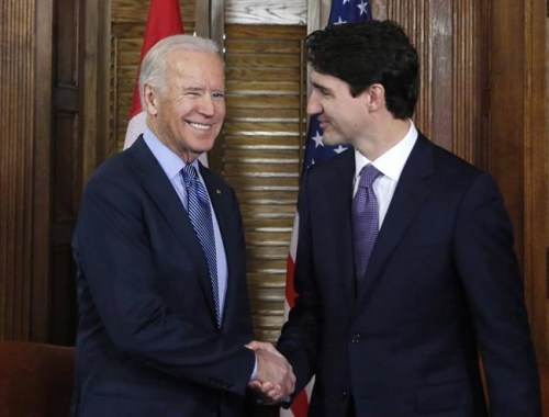 Prime Minister Justin Trudeau shakes hands with Joe Biden, then the outgoing U.S. vice-president, on Parliament Hill in Ottawa on Friday, Dec. 9, 2016. THE CANADIAN PRESS/Patrick Doyle