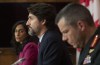 Public Services and Procurement Minister Anita Anand and Major General Dany Fortin look on as Prime Minister Justin Trudeau responds to a question during a news conference in Ottawa, Monday, Dec. 7, 2020. THE CANADIAN PRESS/Adrian Wyld