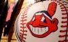 A Chief Wahoo logo is shown on a baseball at the Cleveland Indians team shop, Monday, Jan. 29, 2018, in Cleveland. THE CANADIAN PRESS/AP Photo/Tony Dejak