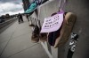 Shoes are hung on the Burrard Bridge in remembrance of victims of illicit drug overdose deaths on International Overdose Awareness Day, in Vancouver, on Monday, August 31, 2020. With overdose deaths rising across Canada, advocates for drug users are calling for the implementation of a national safe supply program as part of an effort to save lives. Failing to do so, they say, will lead to more deaths from overdoses across the country. THE CANADIAN PRESS/Darryl Dyck