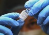 A health-care worker prepares a dose of the Pfizer-BioNTech COVID-19 vaccine at a UHN COVID-19 vaccine clinic in Toronto on Thursday, January 7, 2021. THE CANADIAN PRESS/Nathan Denette